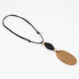 Ebony Drift Oval Pendant Necklace